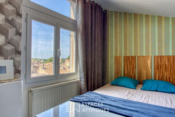 Appartement avec volumes et design sous les toits de la cité médiévale