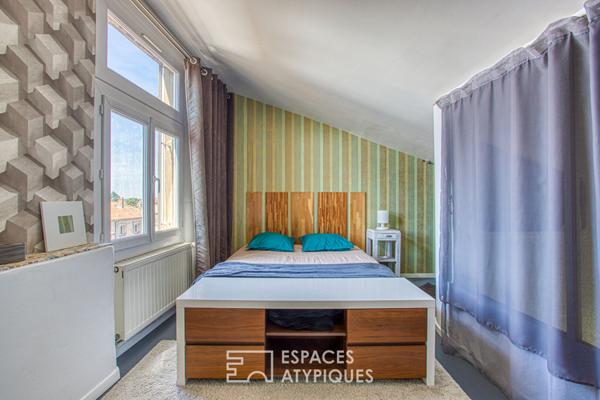 Appartement avec volumes et design sous les toits de la cité médiévale