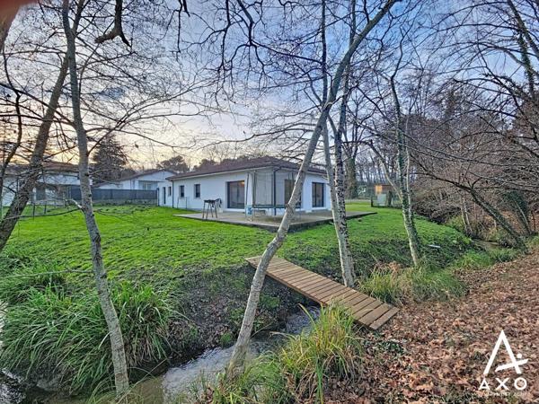 Maison contemporaine de plain pied avec garage et terrain