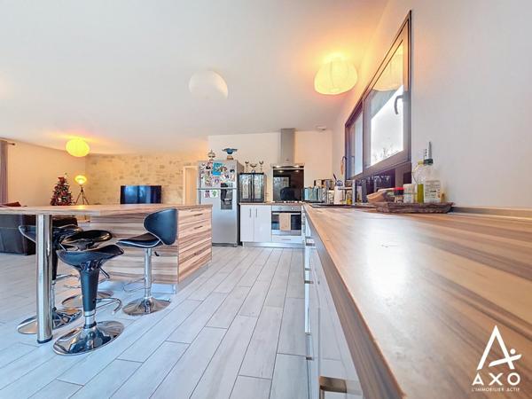 Maison contemporaine de plain pied avec garage et terrain