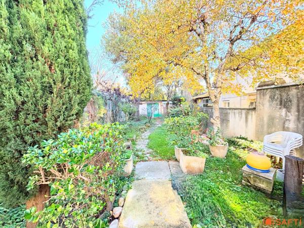 Maison centre ville 195m2, jardin, terrasses.