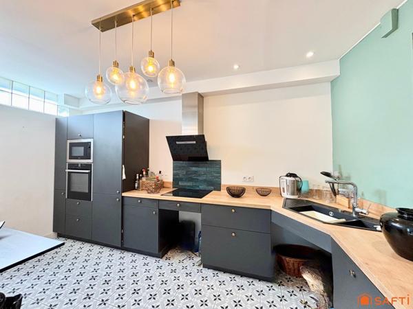 Maison centre ville 195m2, jardin, terrasses.