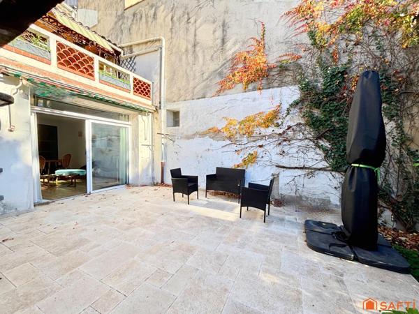 Maison centre ville 195m2, jardin, terrasses.