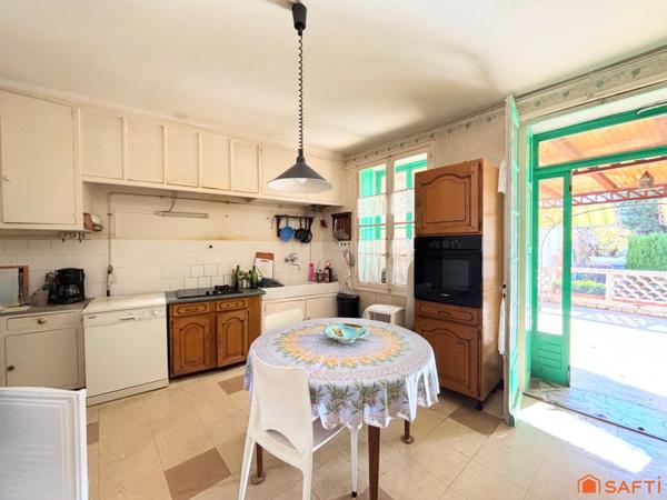 Maison centre ville 195m2, jardin, terrasses.