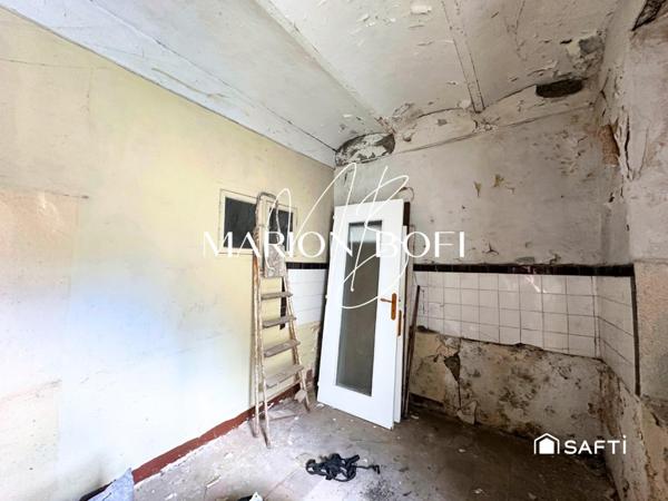 Appartement de 84 m² avec dépendance à rénover