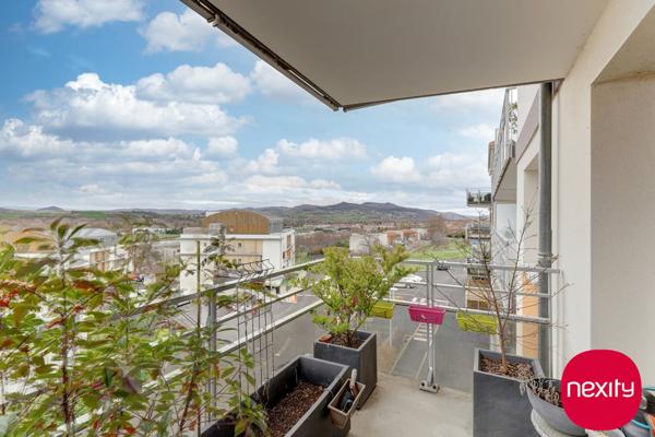 Appartement avec balcon et 2 parkings