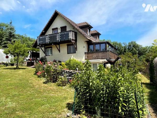 A VENDRE - APPARTEMENT TROIS PIECES - 103,41 m2 - BALCON - TROIS PLACES DE STATIONNEMENTS - CAVE -