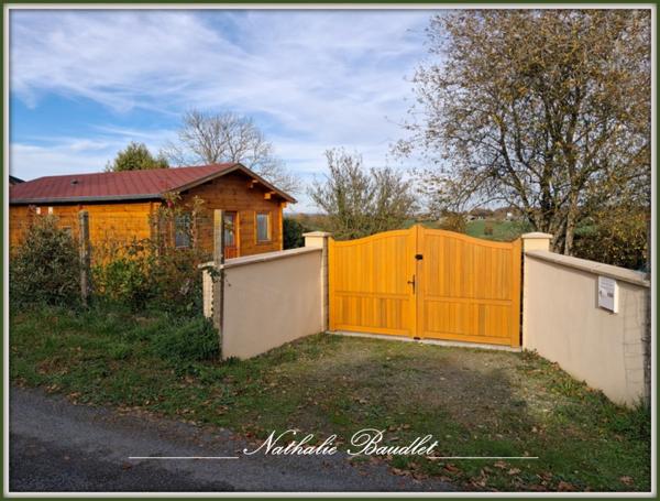 Saint-Symphorien (72240) Chalet en bois 3 pièces avec vue imprenable sur la campagne