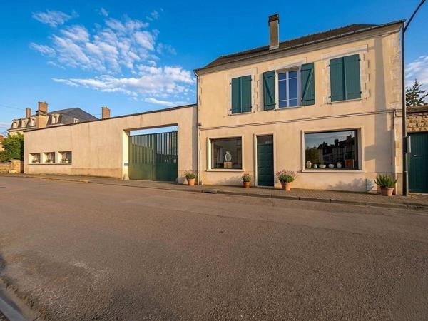 Ensemble immobilier composé de 4 appartements et 300 m² de murs commerciaux LIBRES + jardin