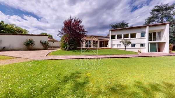 Maison 7 pièce(s) 4 chambre(s) 164 m²