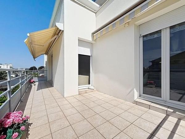 Appartement T4 de 96 m² avec terrasse, garage et parking dans résidence recherchée