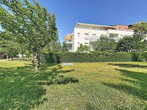 Appartement T4 de 96 m² avec terrasse, garage et parking dans résidence recherchée