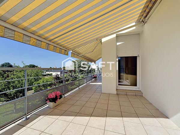 Appartement T4 de 96 m² avec terrasse, garage et parking dans résidence recherchée