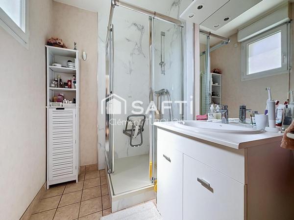 Appartement T4 de 96 m² avec terrasse, garage et parking dans résidence recherchée