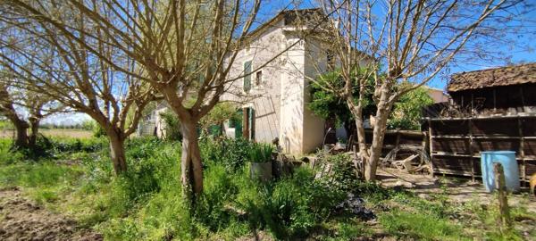 MAISON EN PIERRE A RÉNOVER AVEC JARDIN