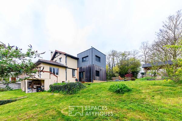 Dualité architecturale : Quand l’extension cubique sublime la tradition à Osny