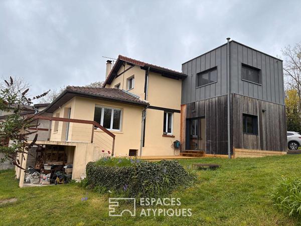 Dualité architecturale : Quand l’extension cubique sublime la tradition à Osny