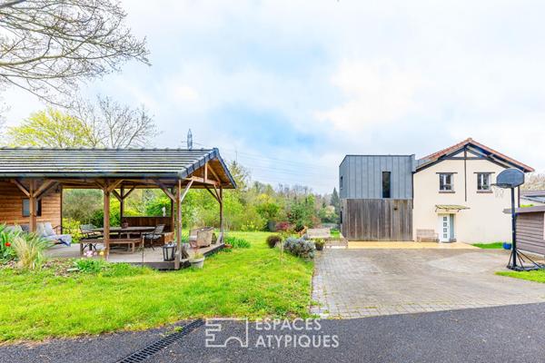 Dualité architecturale : Quand l’extension cubique sublime la tradition à Osny