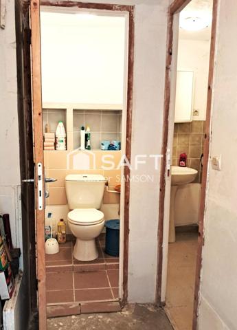 Maison en pierres de deux pièces avec jardinet