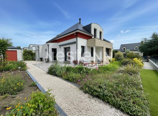 Maison à vendre à Ploeren quartier Kerthomas de style contemporaine 6 pièces vie de plain pied garage