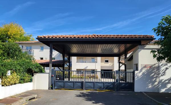 T2 RDC AVEC TERRASSE ET VERDURE