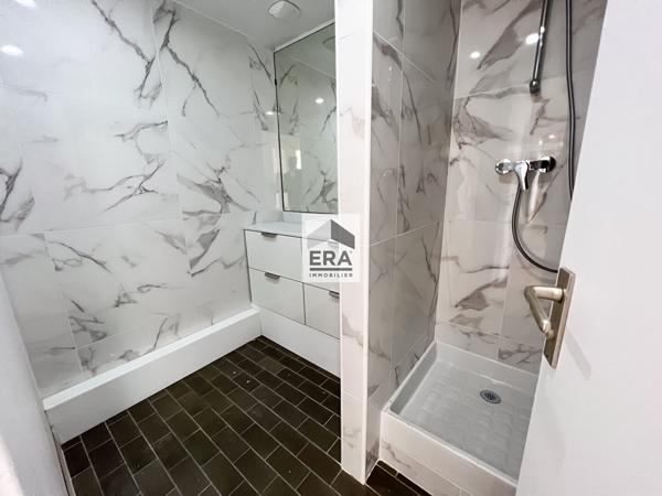 Appartement Paris 4 pièce(s) 123 m2 Avec parking