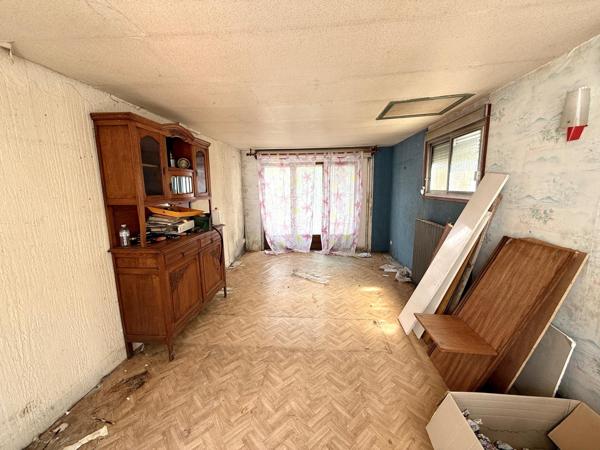 Maison plain pied disposant de trois chambres