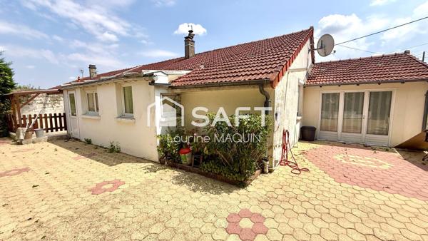 Maison plain pied disposant de trois chambres