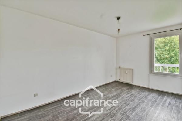 Appartement T4 lumineux avec balcon plein sud, et stationnement privatif