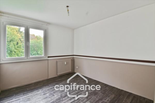 Appartement T4 lumineux avec balcon plein sud, et stationnement privatif