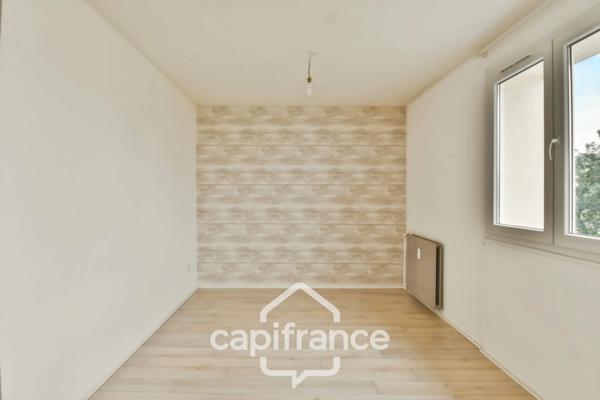 Appartement T4 lumineux avec balcon plein sud, et stationnement privatif