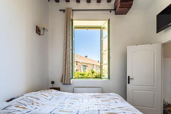 Appartement de caractère avec jardin, au coeur d’un village préservé
