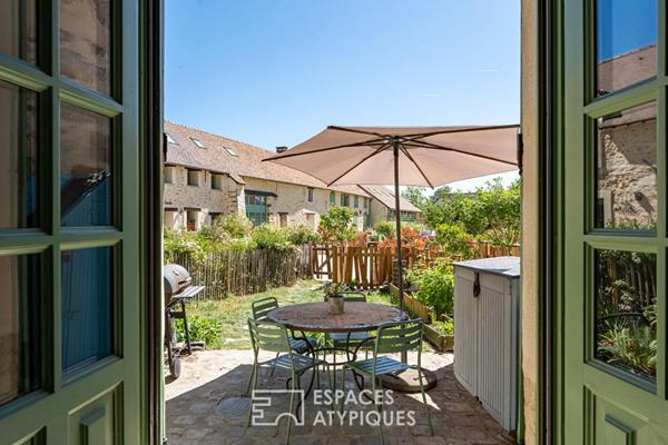 Appartement de caractère avec jardin, au coeur d’un village préservé