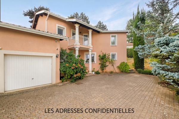 Champagne Au Mont D'or - Maison familiale - 226.50 m² - sur grand parc arboré