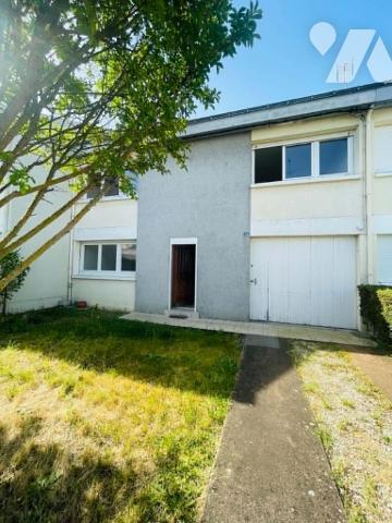 Maison 4 chambres avec garage et jardin proche des commodités 