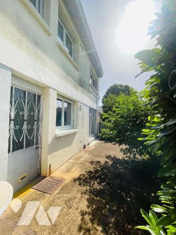 Maison 4 chambres avec garage et jardin proche des commodités 