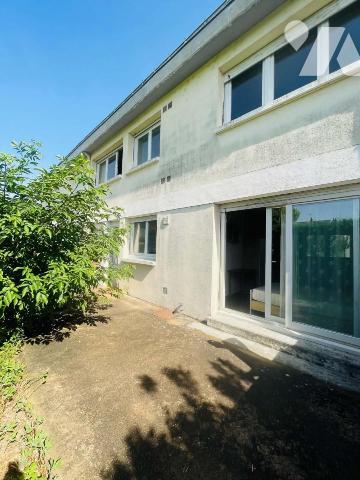 Maison 4 chambres avec garage et jardin proche des commodités 