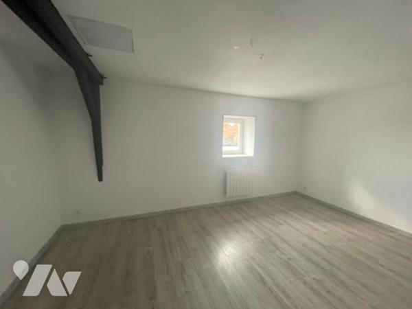 UN IMMEUBLE A USAGE MIXTE