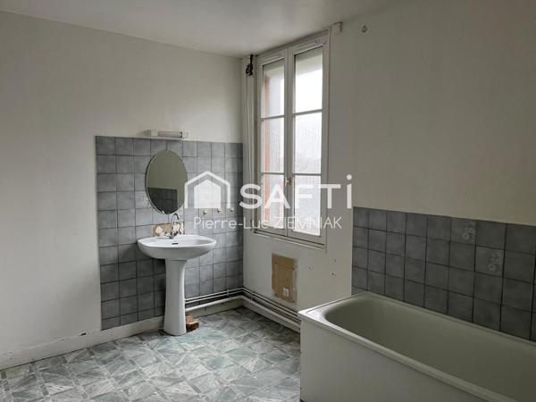 Immeuble divisible 210 m2