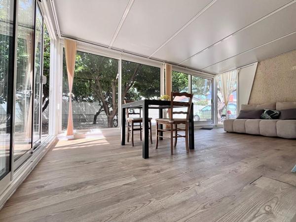 Magnifique appartement de type T2 en rez-de-chaussée avec jardin de 170 m² sans vis-à-vis et véranda de 20 m²