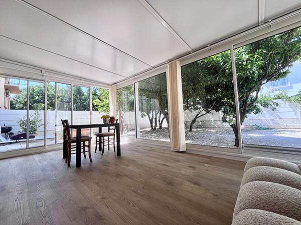 Magnifique appartement de type T2 en rez-de-chaussée avec jardin de 170 m² sans vis-à-vis et véranda de 20 m²
