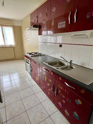 BIEN RARE ! Appartement au centre-ville avec ascenseur, parking et balcon