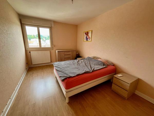 BIEN RARE ! Appartement au centre-ville avec ascenseur, parking et balcon