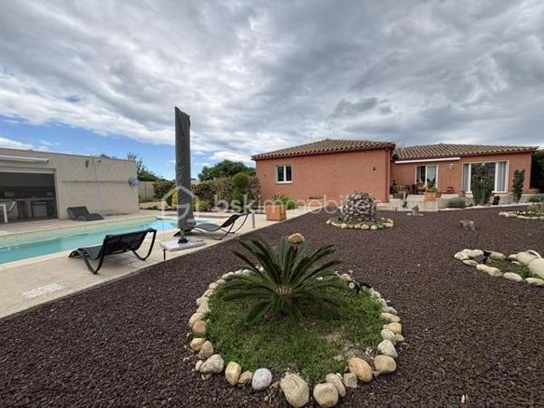 Villa 6 pièces 143 m2 

Très belle villa de plain pied de 143 m2 environ de surface habitable construite sur une parcelle de 1068 m2 ce rajoute une parcelle de 618 m2 constructible 
Ce qui fait un totale de 1681 m2 
Située dans un charmant village Catalan de Pia et dans un lotissement calme à proximité des commerces et toutes commodités 
Pas très loin des plages méditerranéennes, cette maison est un véritable havre de paix entre mer et montagnes dans une commune dynamique et chaleureuse 

* Dès son entrée au rez-de-chaussée, vous serez charmé par une spacieuse pièce à vivre de 40 m², baignée de lumière  avec ses grands baies vitrées ,  ainsi que sa cuisine ouverte, tout équipée, donnant sur une terrasse à proximité de la piscine et sur un jardin paysagé très bien entretenu.

* Vous trouverez également trois chambres avec placard 
* Un bureau qui peut être transformé en une suite parentale avec sa SDE ,WC
* Une SDE avec un wc séparé 
* Clim réversible et un chauffage à gaz 

A l’extérieur, un très beau jardin, arboré avec des arbres fruitiers, arbousiers, citronnier, néflier, oranger …….
* Forage 
* Piscine de 8 x4 avec son rideau de sécurité 
* Un garage de 60 m² à l’extérieur. 
* Un boulodrome de 60 m2 également 
* Une cuisine d’été équipée 
* D.un local piscine 
* D’un toilette indépendant et d’une douche à terminer de rénover 
Vous pouvez y stationner 3  voitures de chaque côté de la maison 
Contactez moi dés aujourd’hui pour organiser une visite pour découvrir ce petit coin de paradis