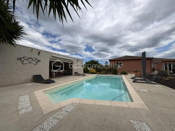 Villa 6 pièces 143 m2 

Très belle villa de plain pied de 143 m2 environ de surface habitable construite sur une parcelle de 1068 m2 ce rajoute une parcelle de 618 m2 constructible 
Ce qui fait un totale de 1681 m2 
Située dans un charmant village Catalan de Pia et dans un lotissement calme à proximité des commerces et toutes commodités 
Pas très loin des plages méditerranéennes, cette maison est un véritable havre de paix entre mer et montagnes dans une commune dynamique et chaleureuse 

* Dès son entrée au rez-de-chaussée, vous serez charmé par une spacieuse pièce à vivre de 40 m², baignée de lumière  avec ses grands baies vitrées ,  ainsi que sa cuisine ouverte, tout équipée, donnant sur une terrasse à proximité de la piscine et sur un jardin paysagé très bien entretenu.

* Vous trouverez également trois chambres avec placard 
* Un bureau qui peut être transformé en une suite parentale avec sa SDE ,WC
* Une SDE avec un wc séparé 
* Clim réversible et un chauffage à gaz 

A l’extérieur, un très beau jardin, arboré avec des arbres fruitiers, arbousiers, citronnier, néflier, oranger …….
* Forage 
* Piscine de 8 x4 avec son rideau de sécurité 
* Un garage de 60 m² à l’extérieur. 
* Un boulodrome de 60 m2 également 
* Une cuisine d’été équipée 
* D.un local piscine 
* D’un toilette indépendant et d’une douche à terminer de rénover 
Vous pouvez y stationner 3  voitures de chaque côté de la maison 
Contactez moi dés aujourd’hui pour organiser une visite pour découvrir ce petit coin de paradis