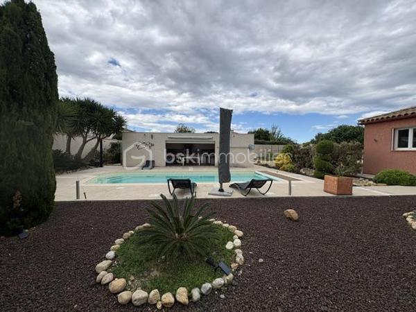 Villa 6 pièces 143 m2 

Très belle villa de plain pied de 143 m2 environ de surface habitable construite sur une parcelle de 1068 m2 ce rajoute une parcelle de 618 m2 constructible 
Ce qui fait un totale de 1681 m2 
Située dans un charmant village Catalan de Pia et dans un lotissement calme à proximité des commerces et toutes commodités 
Pas très loin des plages méditerranéennes, cette maison est un véritable havre de paix entre mer et montagnes dans une commune dynamique et chaleureuse 

* Dès son entrée au rez-de-chaussée, vous serez charmé par une spacieuse pièce à vivre de 40 m², baignée de lumière  avec ses grands baies vitrées ,  ainsi que sa cuisine ouverte, tout équipée, donnant sur une terrasse à proximité de la piscine et sur un jardin paysagé très bien entretenu.

* Vous trouverez également trois chambres avec placard 
* Un bureau qui peut être transformé en une suite parentale avec sa SDE ,WC
* Une SDE avec un wc séparé 
* Clim réversible et un chauffage à gaz 

A l’extérieur, un très beau jardin, arboré avec des arbres fruitiers, arbousiers, citronnier, néflier, oranger …….
* Forage 
* Piscine de 8 x4 avec son rideau de sécurité 
* Un garage de 60 m² à l’extérieur. 
* Un boulodrome de 60 m2 également 
* Une cuisine d’été équipée 
* D.un local piscine 
* D’un toilette indépendant et d’une douche à terminer de rénover 
Vous pouvez y stationner 3  voitures de chaque côté de la maison 
Contactez moi dés aujourd’hui pour organiser une visite pour découvrir ce petit coin de paradis