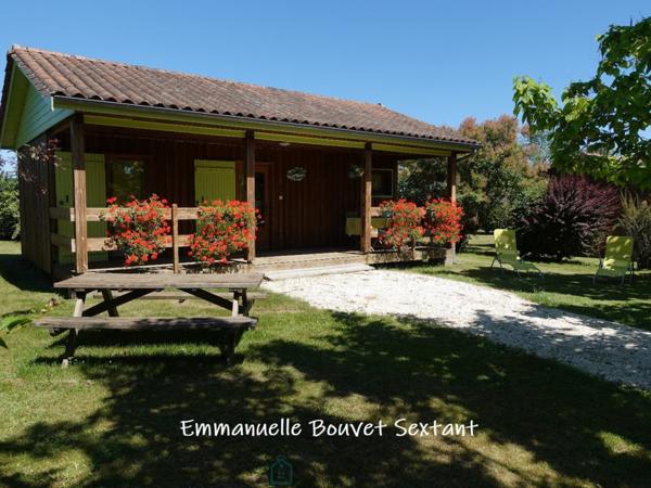 Superbe domaine touristique, 3 ha, 5 chalets bois, salle de réception, maison d'habitation, piscine, divers dépendances