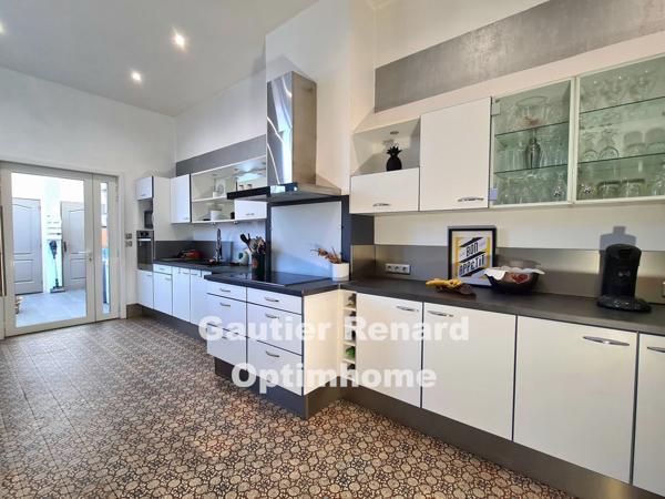 Maison de maître, 7 chambres, jardin, garages à RAISMES (59)