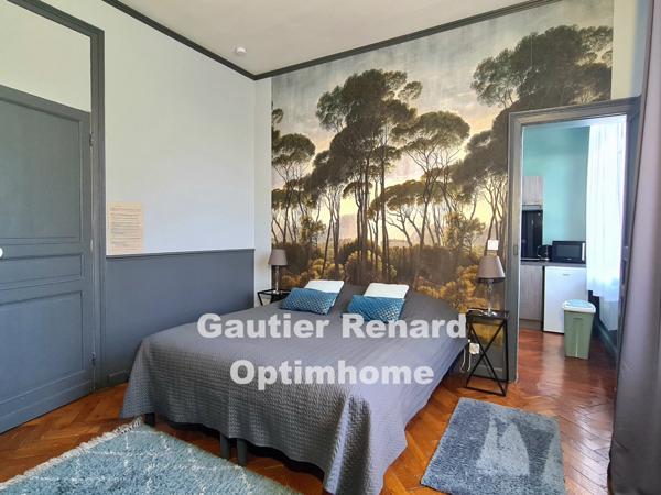 Maison de maître, 7 chambres, jardin, garages à RAISMES (59)