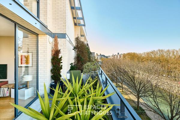 Duplex en dernier étage avec terrasses sur le Canal